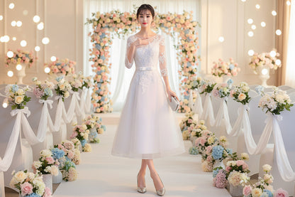 Slim bridesmaid dress with lace bodice, sheer long sleeves, fitted waist and A-line tulle skirt