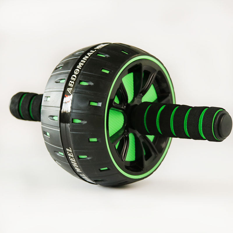 Abdominal wheel with black body, green rim, and ribbed foam handle grips