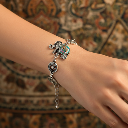 Elephant charm silver bracelet with linked charms and oval clock face