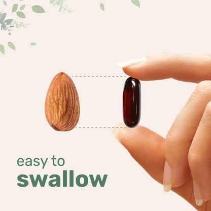 Softgel capsule being swallowed, shown with a hand and pumpkin seed oil drops graphic