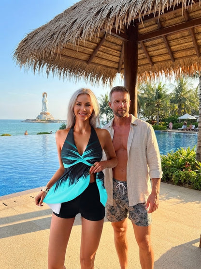 Cyan tankini swimsuit set with cross-front halter top and black swim shorts