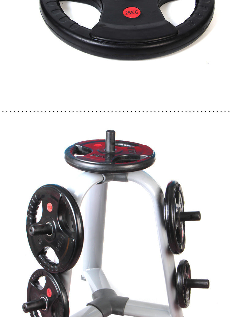 2.5 kg barbell weight disks on rack, black plates with red KG numbers