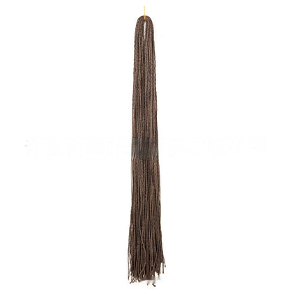 Medium brown braided crochet hair extension with long fringe tassels