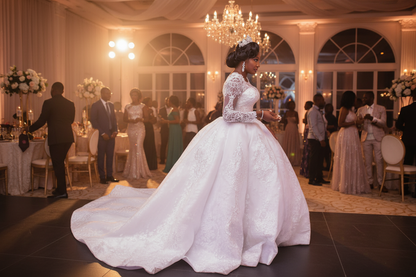 White lace wedding dress, long sleeves, round neck, flowing train and structured bodice