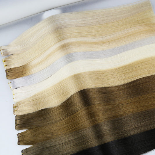 Straight real hair extension weft, mixed blonde and dark brown strands