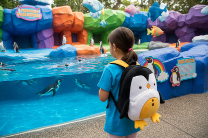 Penguin plush backpack with black body and white belly