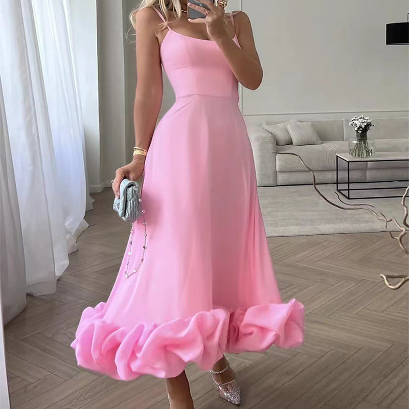 Pink A-line dress with spaghetti straps and 3D flower hem ruffle