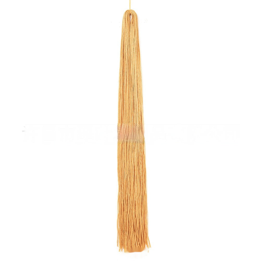 Long braided crochet hair bundle in golden yellow