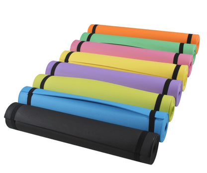 Rolled yoga mat set in black, blue, yellow, green, pink, and orange with bands