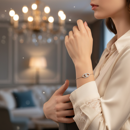 Silver bracelet with heart-shaped pavé charm on raised wrist