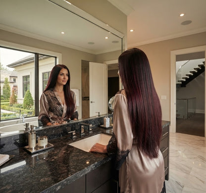 Long dark auburn halo hair extension, straight strands behind the shoulders