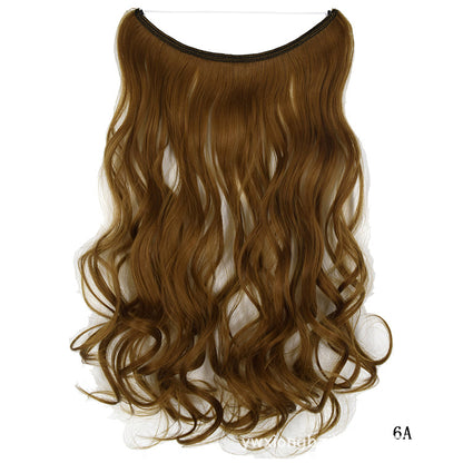 Wavy hair extension wig in honey blonde, curved top, long flowing waves