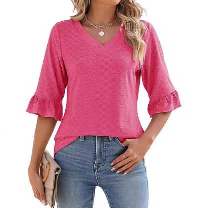 Women’s pink textured V-neck short-sleeve top with ruffle cuffs