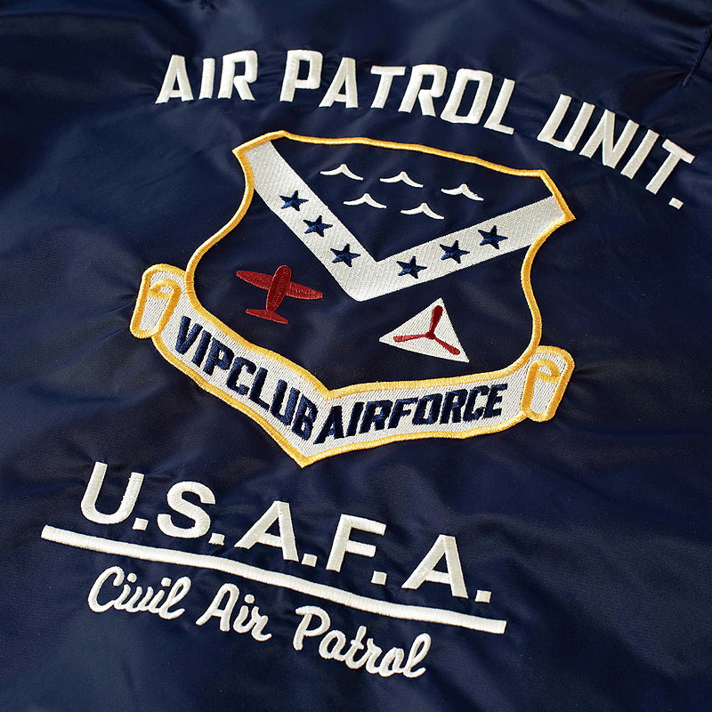 Embroidered Air Patrol Unit patch on a navy bomber jacket