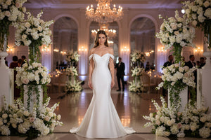 Ivory satin V-neck mermaid wedding dress with off-shoulder neckline, fitted bodice
