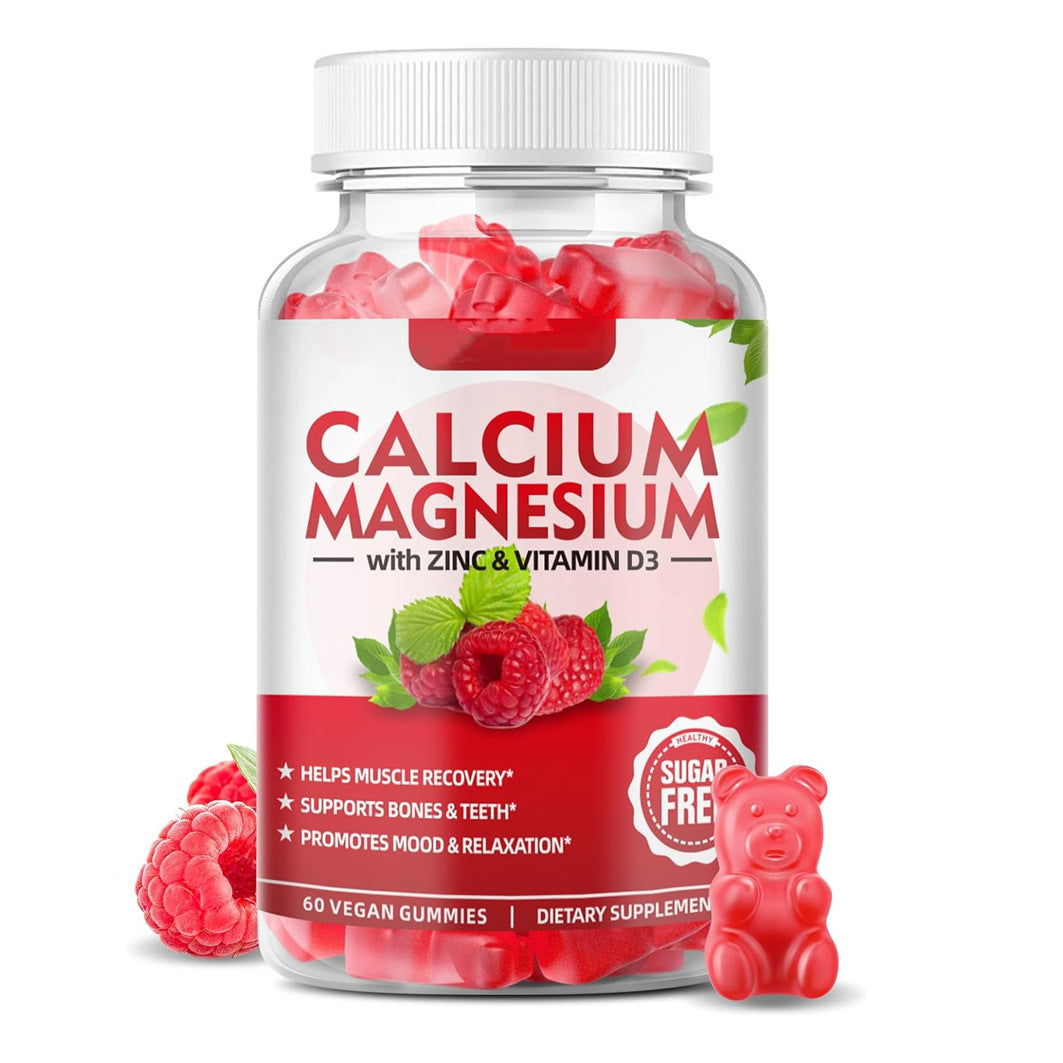Calcium magnesium supplement bottle with zinc and vitamin D3; red gummy bears