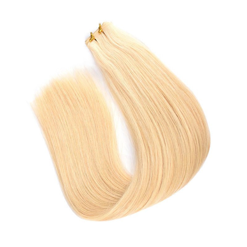 Real hair extension bundle, straight blonde strands with stitched weft ends