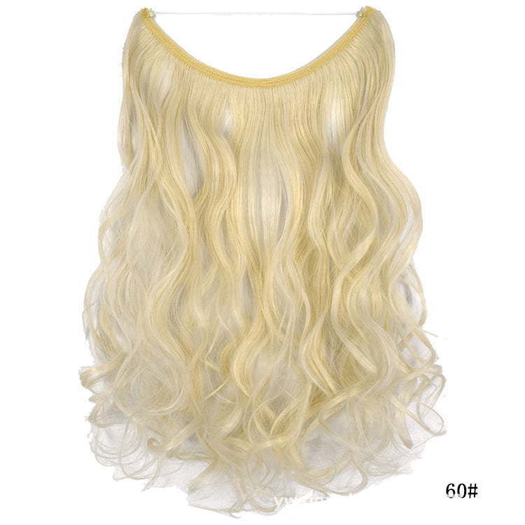 Seamless one-piece hair extension wig with long wavy blonde hair, no visible part