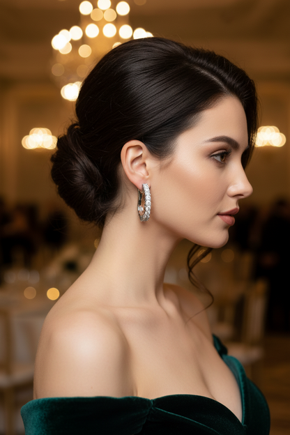 Silver-tone hoop earrings with clear stones, prong-set for a sparkling band