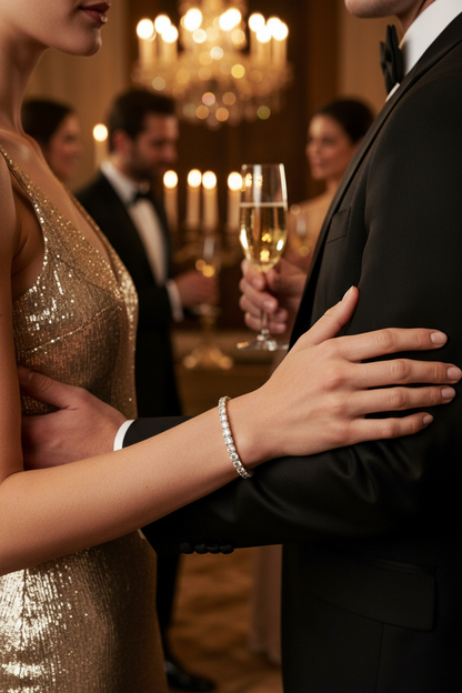 Silver tennis bracelet with bright round pavé stones along the band