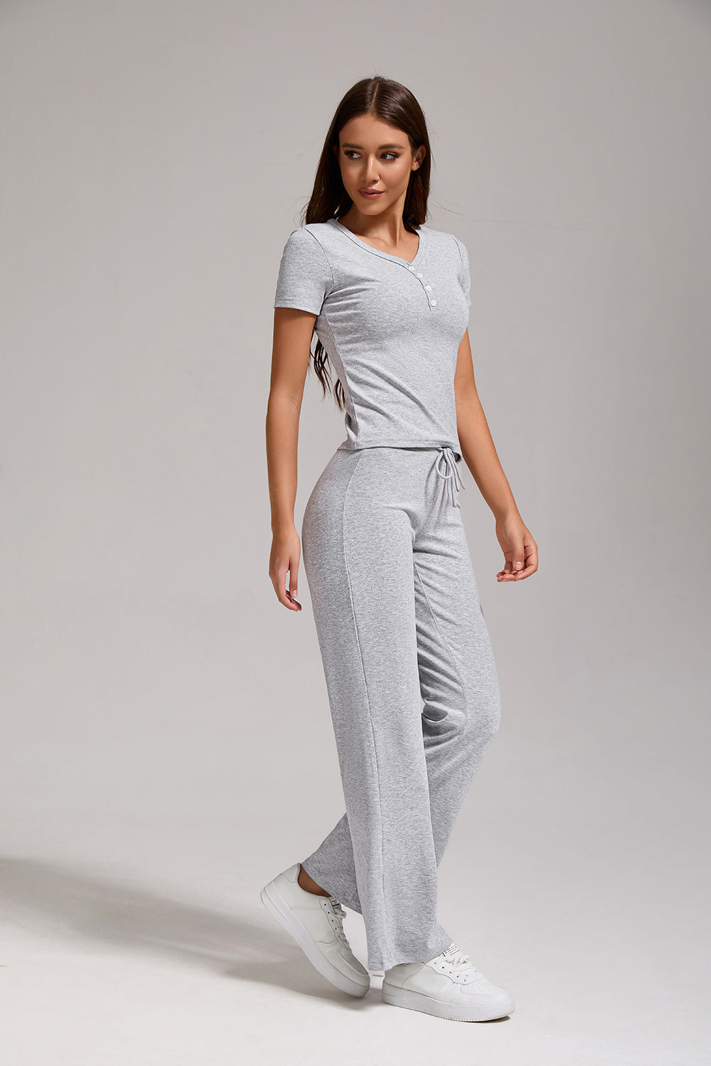 Women's Casual Two-piece Set With V-neck Button, Short Sleeved, Low Waisted Flared Pants, Sportswear