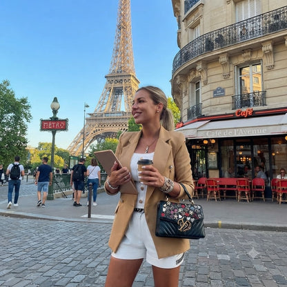 Women’s khaki double-breasted blazer with notched lapels and button front