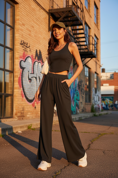 Black sleeveless crop top and wide-leg pants suit set