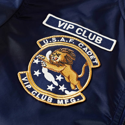 Embroidered VIP CLUB patch on a dark bomber jacket