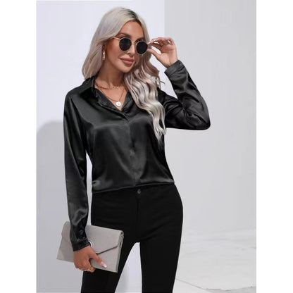 Black satin button-up long-sleeve shirt with one-button placket and pointed collar.
