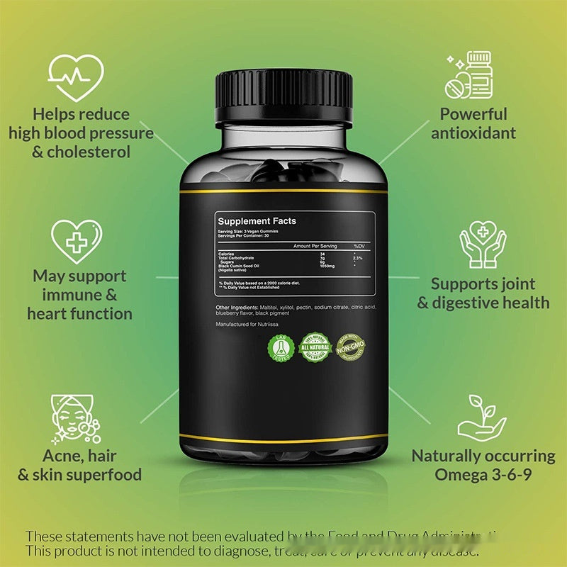 Black seed oil gummies supplement bottle with black label and ribbed black cap