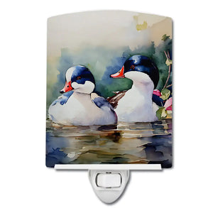 Ceramic night light tile with bufflehead ducks and white wall plug.