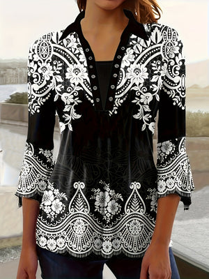 Black printed button-front top with white floral medallion hem and 3/4 sleeves