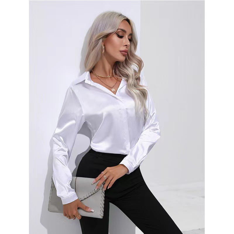 White satin button-up long-sleeve shirt with one-button placket and pointed collar.