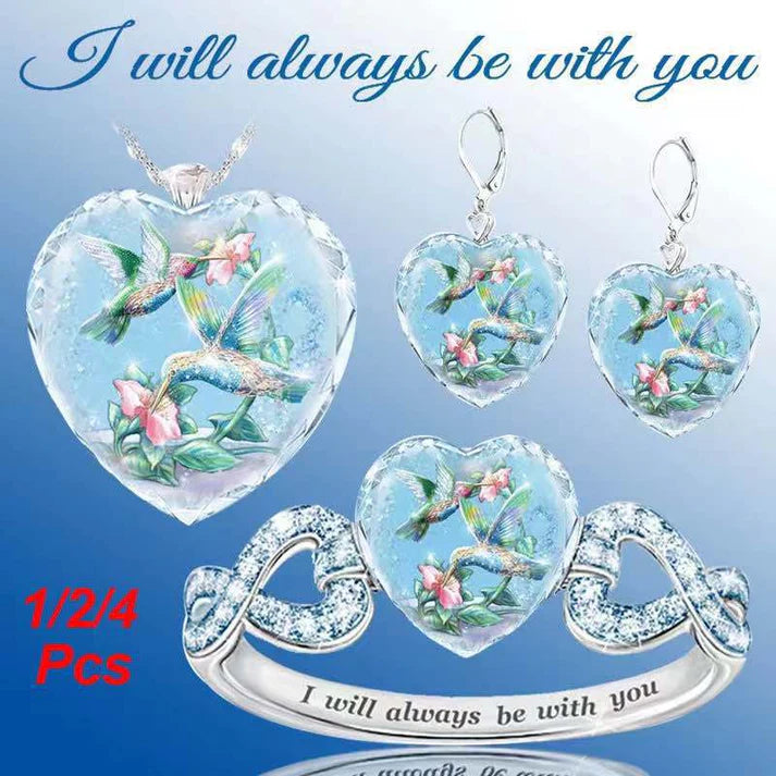 Silver heart pendant necklace set with blue hummingbird floral heart pieces and drop earrings
