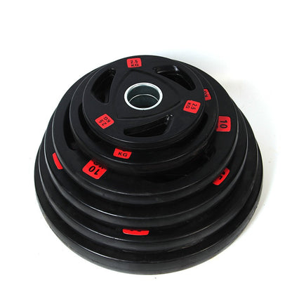 Black 2.5 kg barbell weight disk with central metal bushing and red KG markings