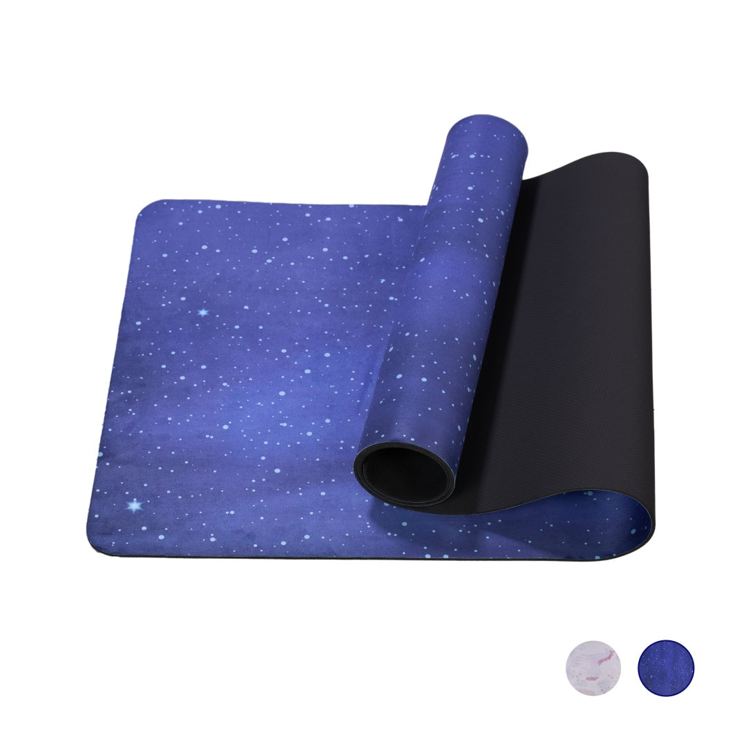 Blue galaxy print yoga mat with non-slip underside, rolled edge visible